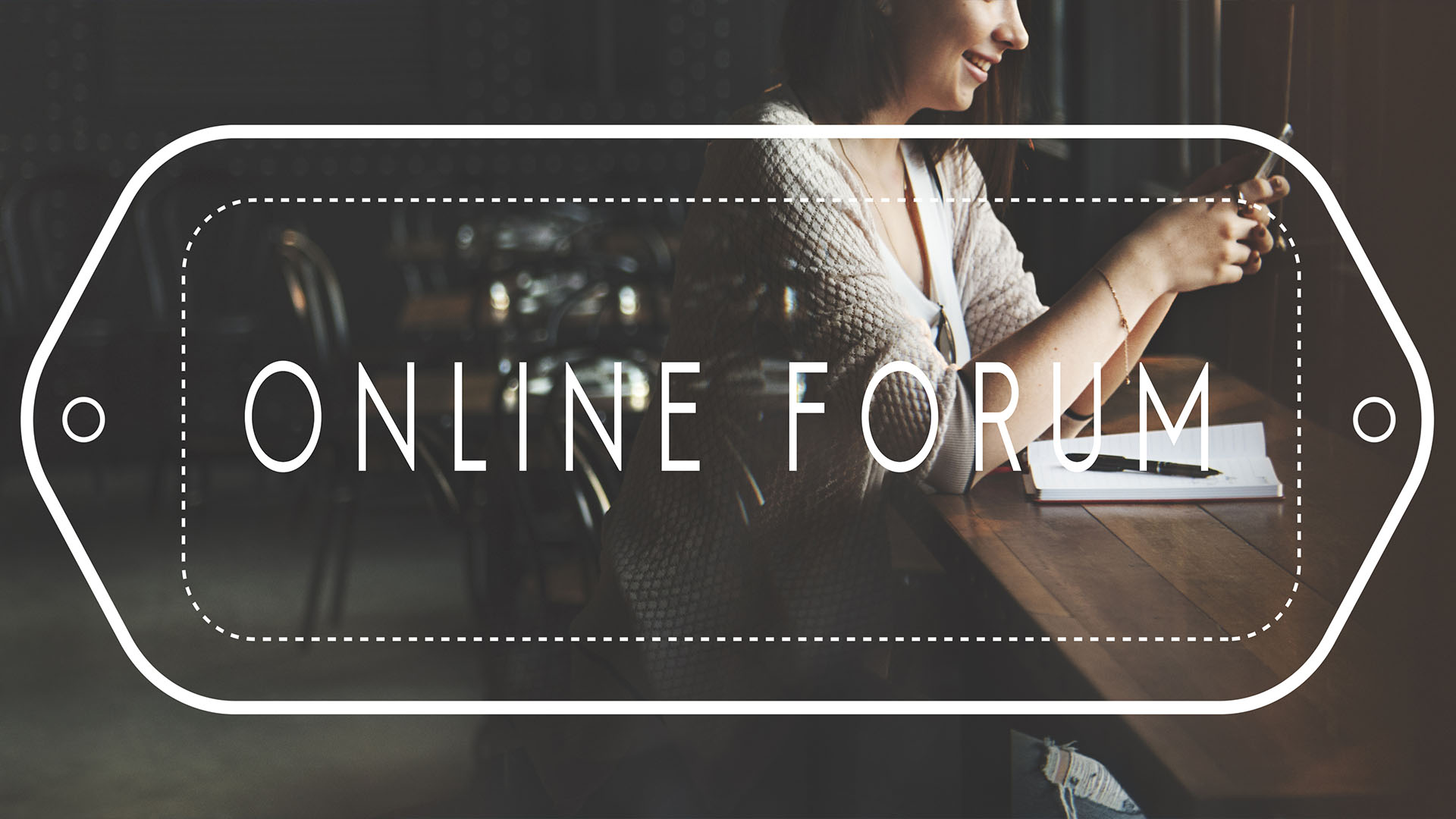 Brunette woman sitting down while looking at her phone and smiling. White card outline spelling 'Online Forum' in front.